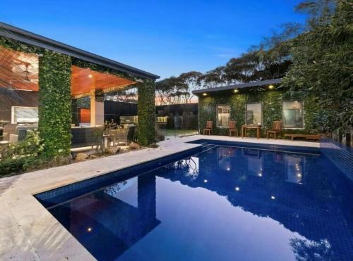 Rye House | Aroha Moana - Luxe Pool Retreat, Fireplace & Pet Friendly