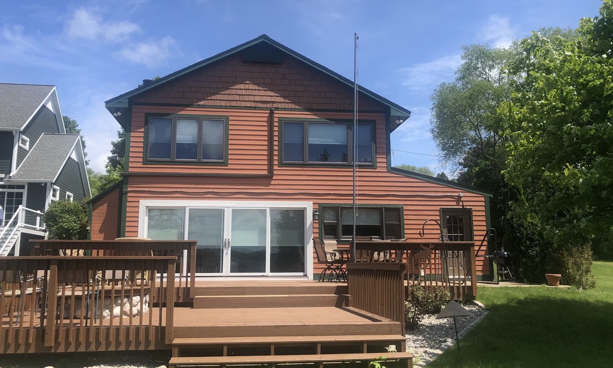 Traverse City House | Beautiful spot on Lake Leelanau, 4-bedrooms, includes dock and kayaks.