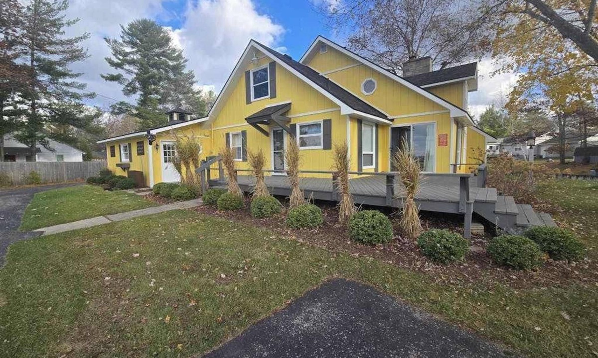 Indian River House | Cottage on the canal to Burt Lake with large patio and space for boat