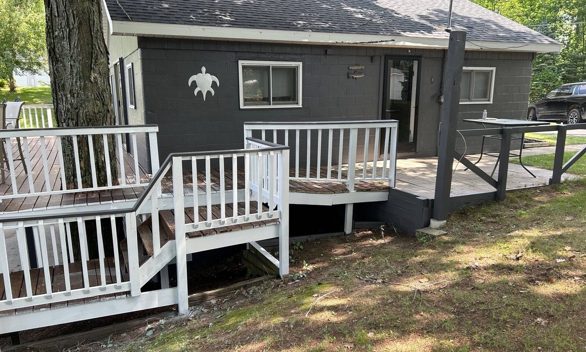 Curtis Township Cottage | Cozy cottage in Glennie MI on all sports North Lake with deck, dock & firepit.