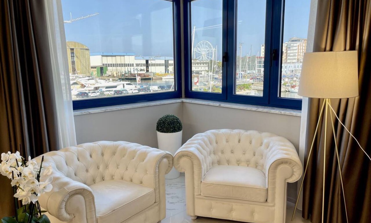 Viareggio Apartment | Elegant flat on the second floor with lift with modern fittings and large windows with a splendid view over the Viareggio dock just a few minutes' walk from the promenade and the sea.Elegantly furnished, it consists of two tastefully furnished double bed