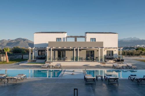 Panormos Villa | Pura Vida Villa, 2 Heated Pools, Hot Tubs & Sauna, By ThinkVilla