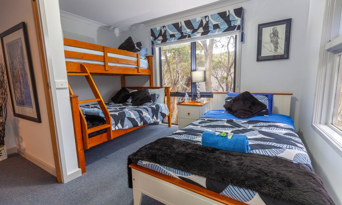 Baw Baw Village Cabin | Tanjil Creek Lodge - Bedroom 3 (Family room with a view of the Toboggan Park)