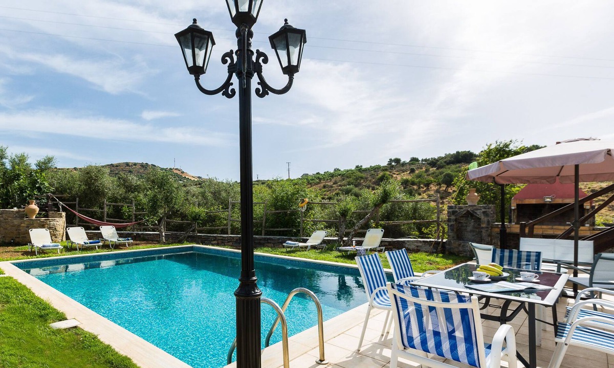 Panormos Villa | Villa Eleutheria, a cozy and private retreat with an outdoor Pool and Jacuzzi.