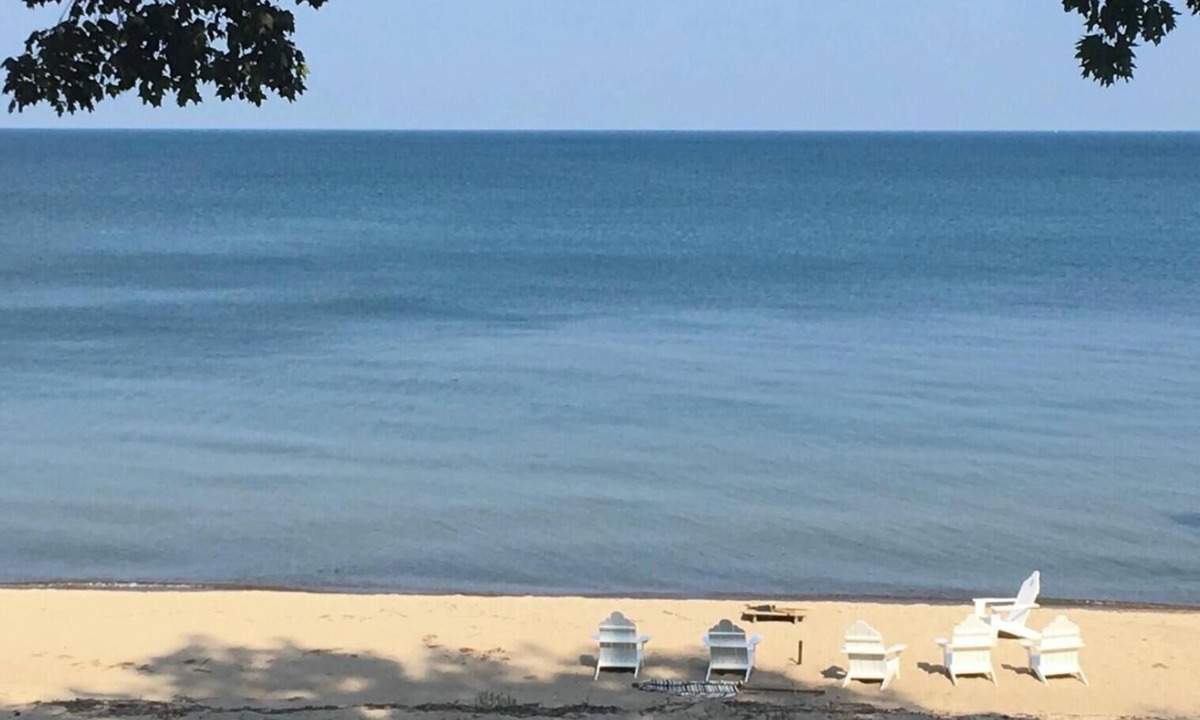 Tawas City Cottage | Welcoming Lake Huron Cowboy Cottage with AC, kayaks, & more in Tawas