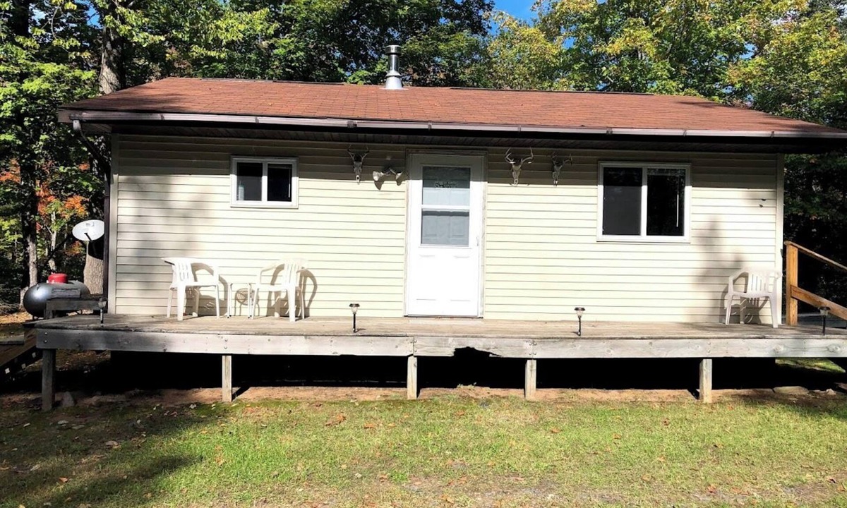 Skanee House | Welcoming off Grid 2-bedroom Cabin in Skanee. On the Big Huron River Fish camp!