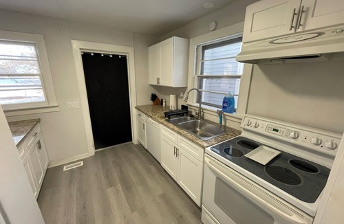 Lansing House | 12 Minutes from MSU, 3 Bedroom House with Laundry