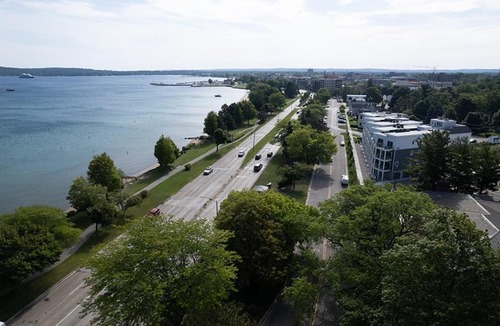 Traverse City Apartment | 2BDR Lake View 1st Floor Condo steps to Beach 103E