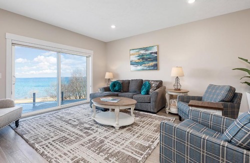Traverse City Apartment | 2BDR Lake View 1st Floor Condo steps to Beach 103E
