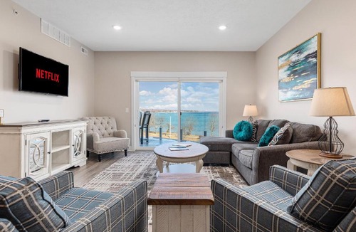 Traverse City Apartment | 2BDR Lake View 1st Floor Condo steps to Beach 103E