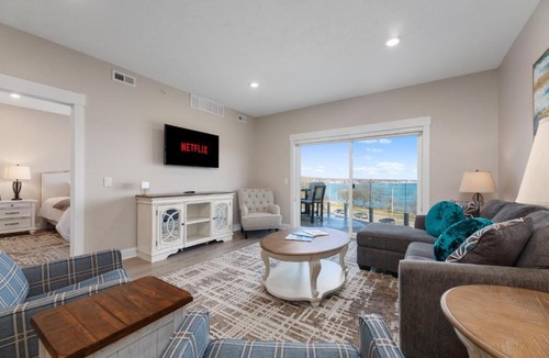 Traverse City Apartment | 2BDR Lake View 1st Floor Condo steps to Beach 103E