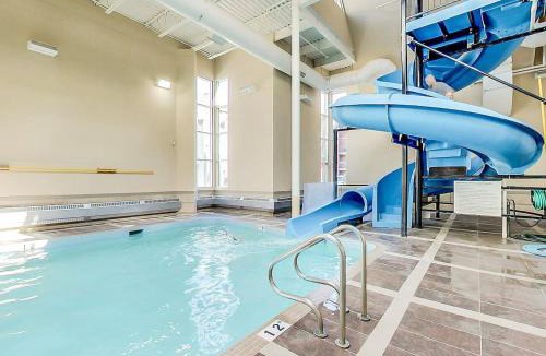 Canmore Apartment | 2BR Scenic Rockies Retreat BBQ Hot Tub and Pool
