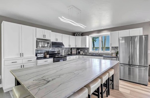 Brazeau Cottage | Amber's White Potato Lake House w/Sandy Shore