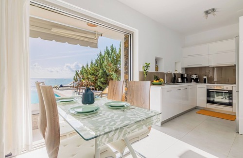 Pefki Villa | An exquisite and luminous seaside villa. The epitome of coastal serenity.