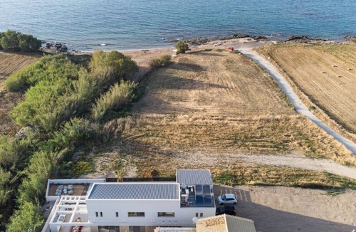 Sfakaki Villa | Beachfront Villa with Eco heated Pool, Hot Tub, Playroom and walk to restaurants