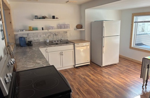 Menominee House | Beautiful 3-bedroom townhome with bay views in charming downtown Menominee