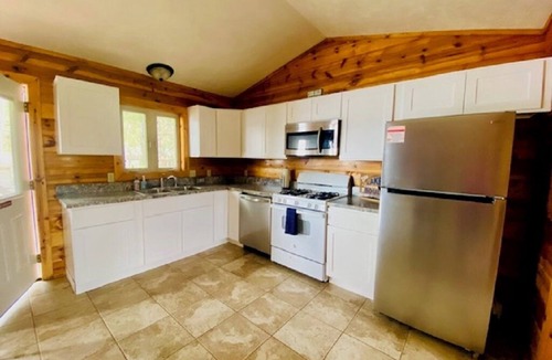 Mayfield Cabin | Beautiful Waterfront, Traverse City AC, dog ok, pontoon rentals, outdoor hot tub