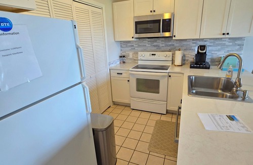 Spring Lake Condo | Charming 1 bedroom, 1 bathroom condo with spacious kitchen and walkout patio