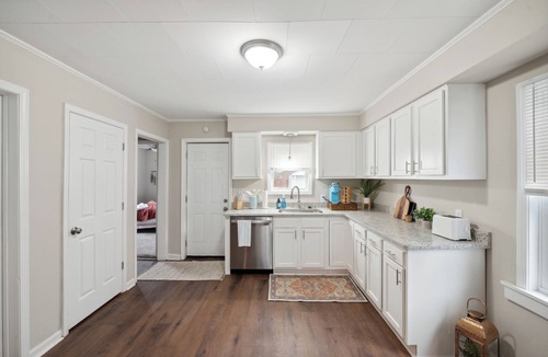 Toledo House | Charming 2br home on Swan Creek! Private office.