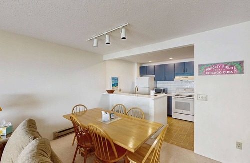 Maple City Condo | Condo in Glen Arbor with Lake Michigan sunset views, fireplace, deck, washer & dryer