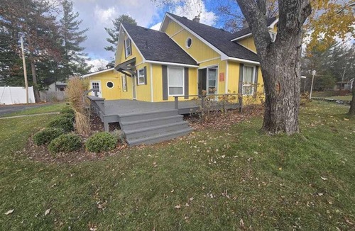 Indian River House | Cottage on the canal to Burt Lake with large patio and space for boat