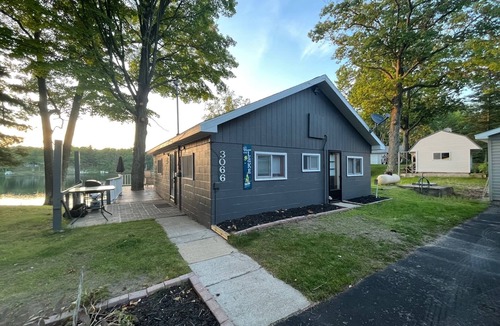 Curtis Township Cottage | Cozy cottage in Glennie MI on all sports North Lake with deck, dock & firepit.