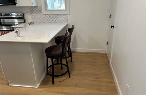 Midland House | Cozy, newly renovated home with a gorgeous fireplace and office space.