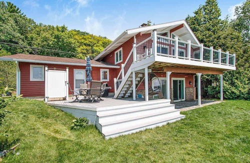 Beulah House | Dreamy escape on the water of Crystal Lake w/spacious deck & private dock