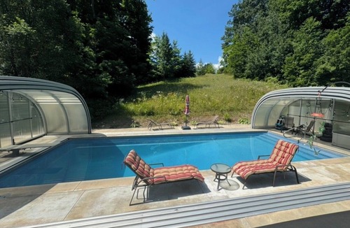 Traverse City Apartment | Elegant 2 bedroom apartment on 10 wooded acres outside Traverse City MI