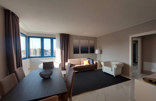 Viareggio Apartment | Elegant flat on the second floor with lift with modern fittings and large windows with a splendid view over the Viareggio dock just a few minutes' walk from the promenade and the sea.Elegantly furnished, it consists of two tastefully furnished double bed
