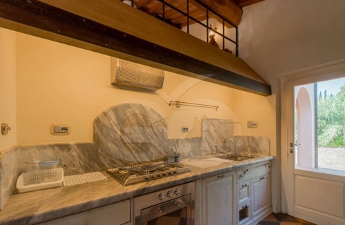 Porto Azzurro Villa | Elegant Villa Ivana 7/8 bed immersed in a green garden 600 meters from Reale beach