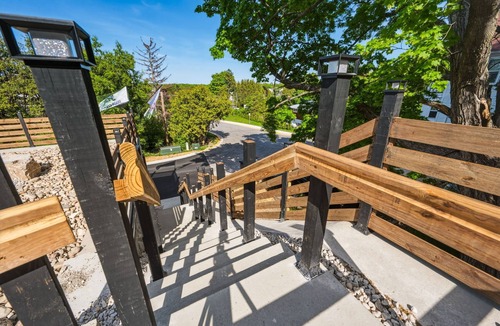 Sister Bay Condo | First Floor Condo with Covered Patio & Water Views in Sister Bay