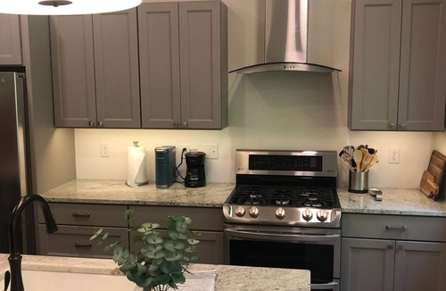 Traverse City Condo | Forest & Brook View Condo – Tranquil Porch, Minutes to TC Breweries & Cafés!