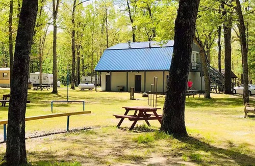 Irons House | Forest campground! 1 BR RV with Bath house