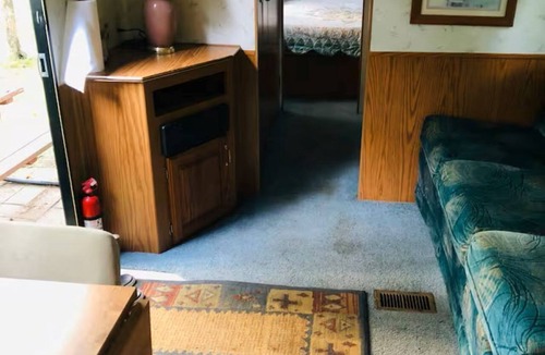 Irons House | Forest campground! 1 BR RV with Bath house