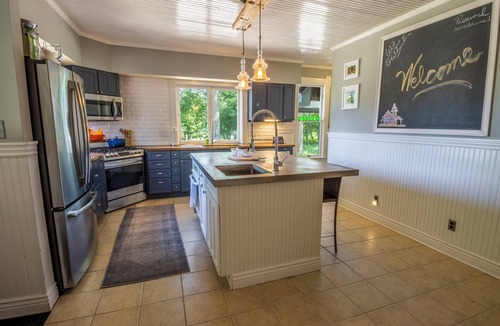 Tryon Farm House | Historic Farmhouse with Hot Tub, Treehouse Shower, & Chickens!