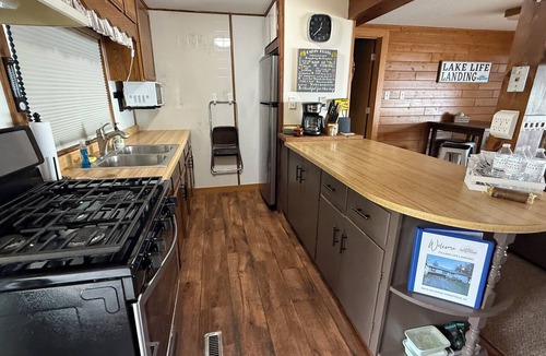 Manistique Cottage | Lake Life Landing Indian Lake Waterfront w/Private Dock