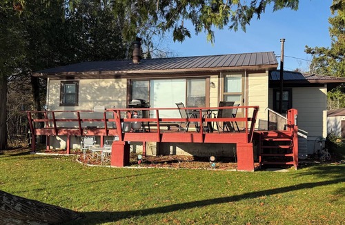 Manistique Cottage | Lake Life Landing Indian Lake Waterfront w/Private Dock