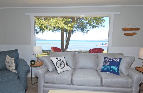 Glen Arbor Cottage | Lakefront cottage with amazing views, a spacious deck, grill, cable & dock
