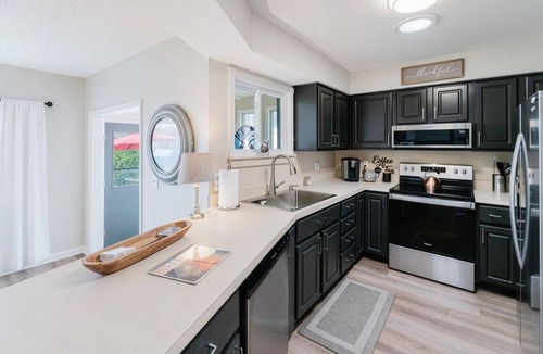 Lake Orion House | Lakefront Retreat w/Kayak, Deck & Fire Pit!