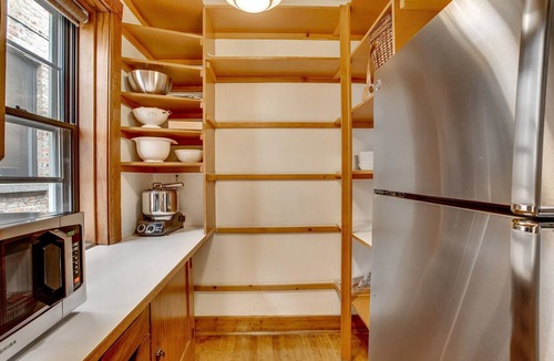 North Center Apartment | Light Filled with Tasteful Pops of Color - You Will Love This Mid-Century Modern Gem by AllSet Turnover