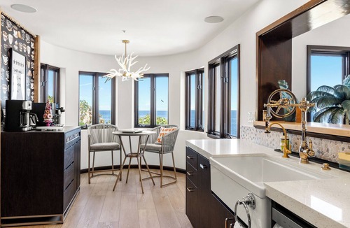 Avalon Condo | Luxury 4BR Villa: Vaulted Ceilings + Ocean Views + 6-seat golf cart.