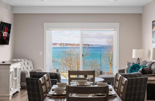 Traverse City Apartment | Luxury Downtown 2BDR Lake View Penthouse Condo steps to Beach 302W