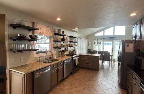 Sister Lakes House | Magician Lakefront - 7 bedrooms, 4.5 baths, and a screened in porch.