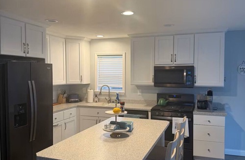 Russells Point House | Marvelous 3-bedroom lakefront house in Russells Point w/boat dock & fire pit