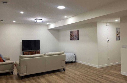 Chestermere Apartment | Modern & Spacious Suite close to Lake with Hot tub and Free Parking!