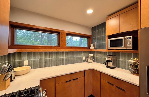 Grand Beach House | New Listing/remodeled mid century 1 block from lake w hot tub on wooded lot!