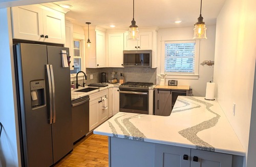 Frankfort House | NEW! The Frankfort Beach Retreat- Gorgeous, Dog-Friendly, and Great Location! Includes Hot Tub and Advanced Central Air Conditioning System! 5 Kayaks and a Paddleboard Included! Perfect Family Getaway!