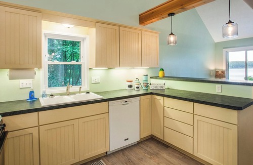 Newaygo House | Newly Renovated Lake Front Home w/ Sandy Beach