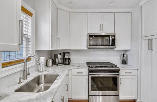 Ottawa Hills House | Ottawa Hills Bliss: Luxe 2BR with Hot Tub & King!